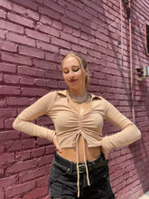 Load and play video in Gallery viewer, tan crop top with long sleeves and a v neck
