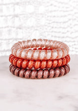 Load image into Gallery viewer, dusty rose 3 hair tie coil set sparkly and red colors
